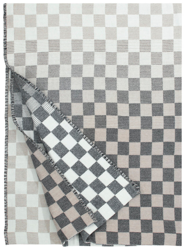 Schachbrettmuster der SHAKKI Wolldecke in Schwarz-Beige-Weiß