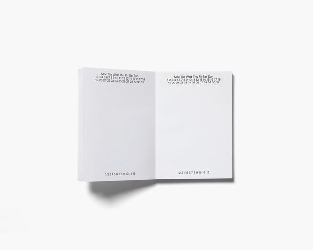 Aufgeschlagenes Journal 184 mit Wochentagszeile, Tageszahlen 1 bis 31 und Monatszahlen zum Markieren
